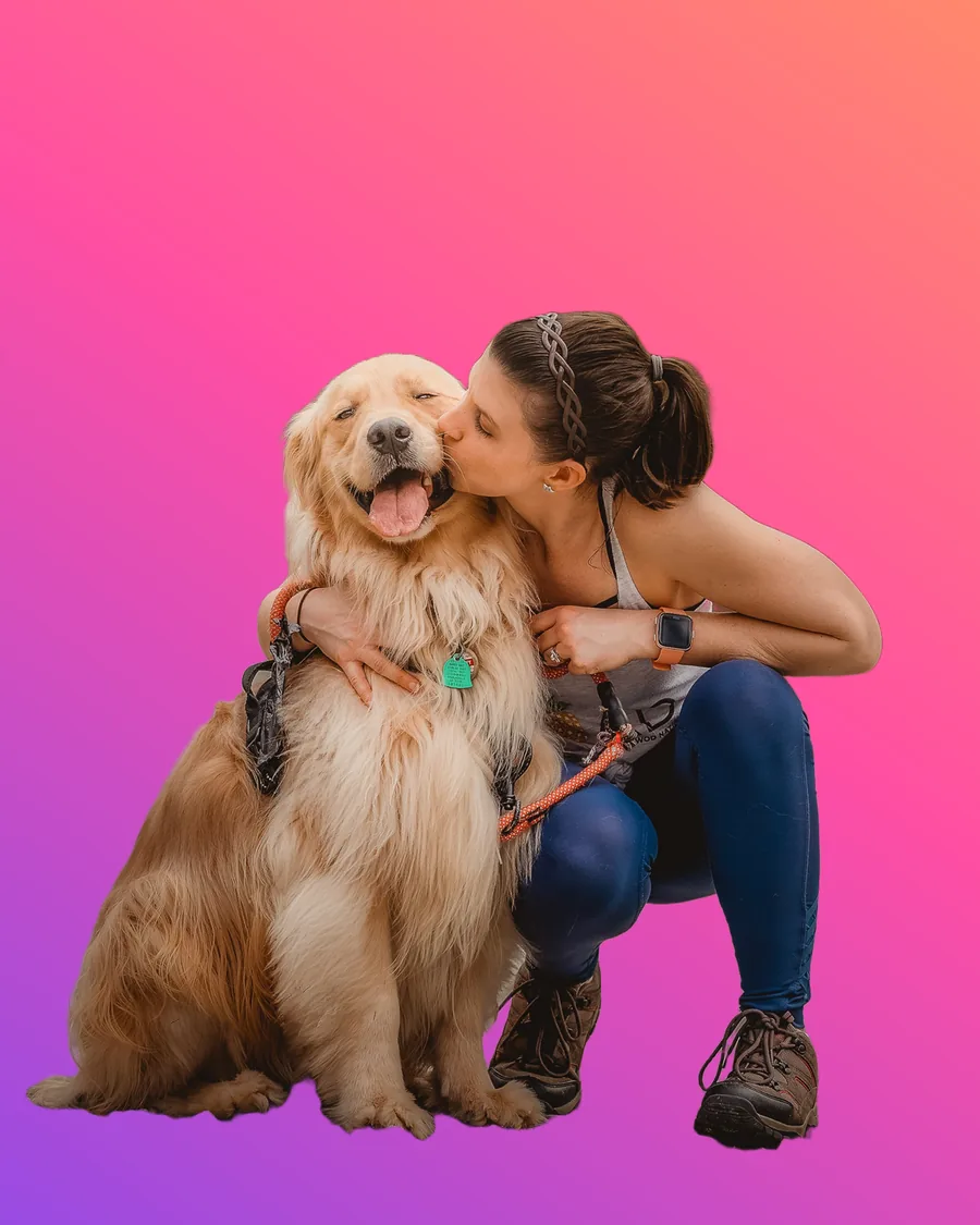 Woman hugging her golden retriever, background replaced with a warm gradient, after